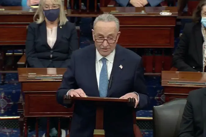 In this image from United States Senate television, US Senate Minority Leader Chuck Schumer (Democrat of New York) makes remarks as the US Senate reconvenes to resume debate on the Electoral Vote count following the violence in the Capitol.
